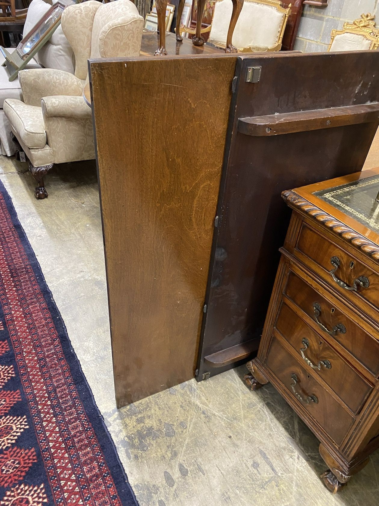 A George III style mahogany twin pedestal D end extending dining table, length 158cm, 248cm extended, two spare leaves, width 110cm, height 72cm